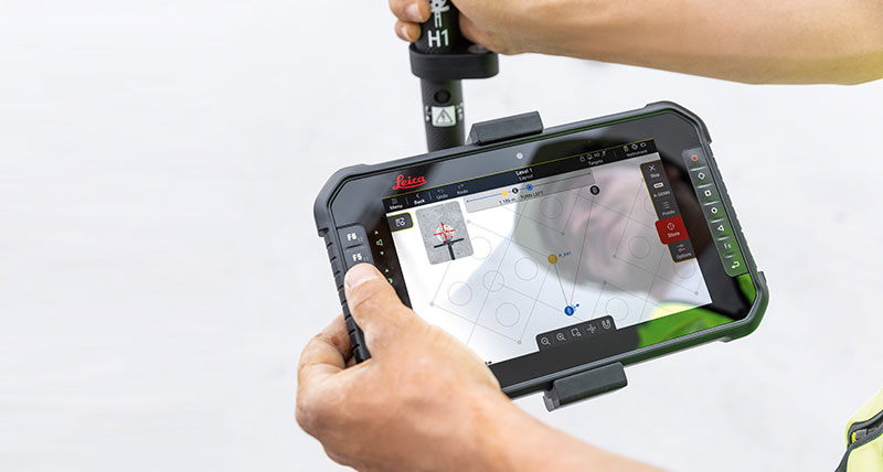 Leica iCON trades software on black tablet showing supported PSF, CSV, IFC, DXF, and DWG format options.